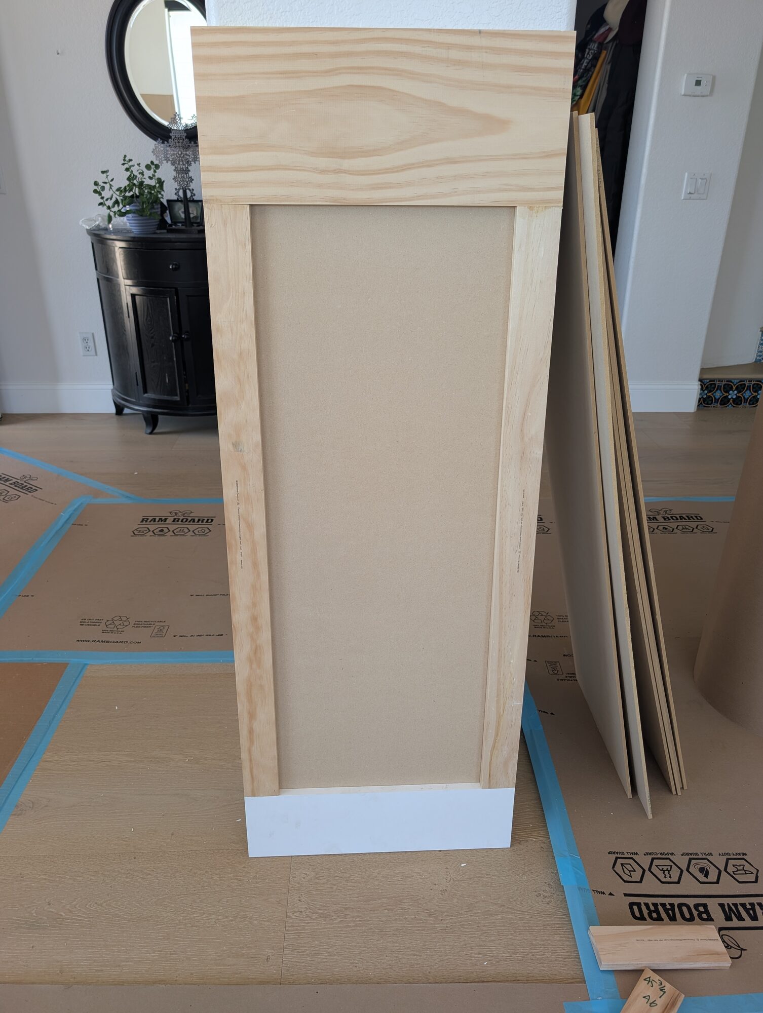 Assembled wainscoting column panel with pine frame and MDF field, built on site in Rancho Cucamonga