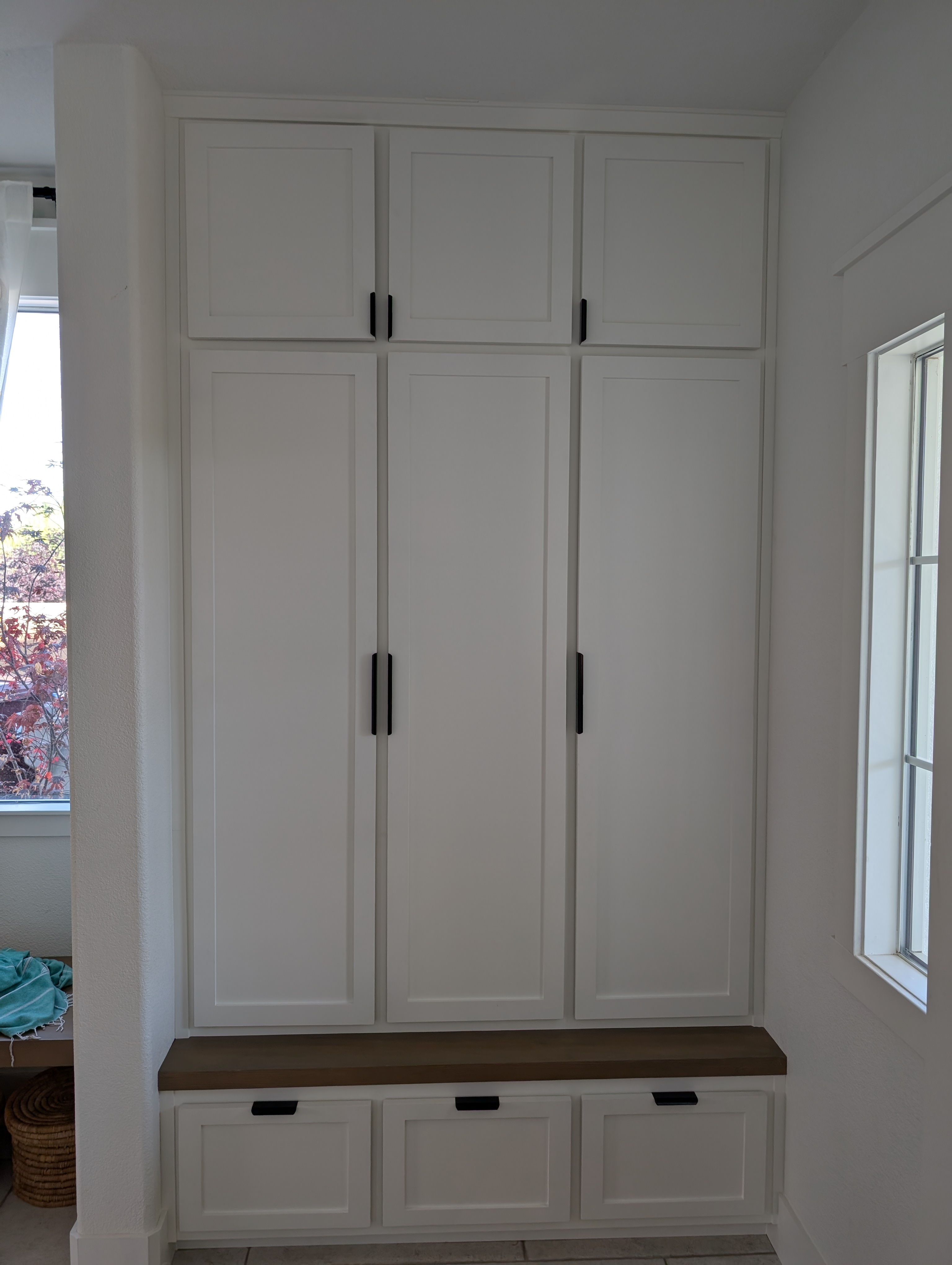 Finished floor-to-ceiling mudroom built-in with lockers, bench and drawers, Menifee CA