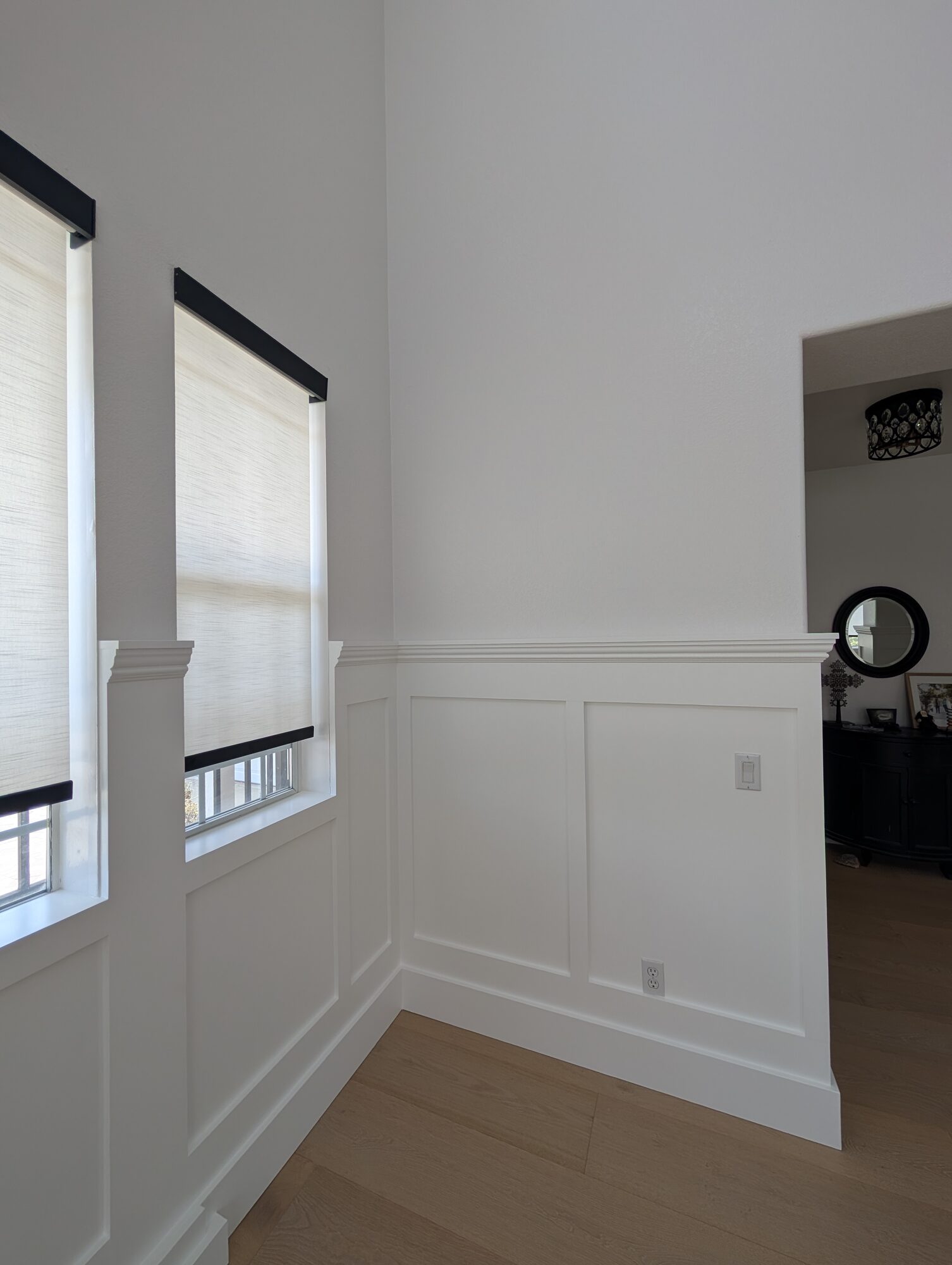 Corner of dining room wainscoting meeting windows with clean terminations, Rancho Cucamonga home