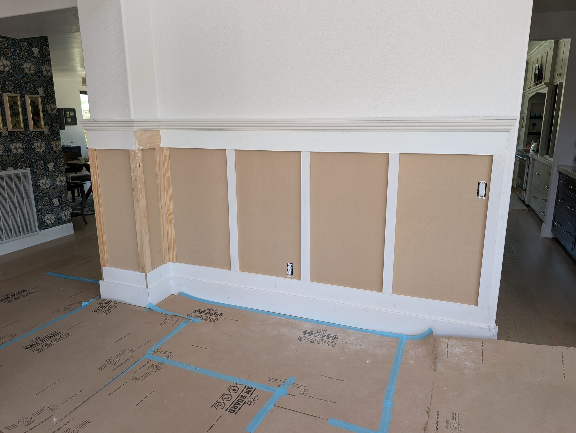 Wainscoting installation in progress, MDF panels and pine stiles on dining room wall, Rancho Cucamonga