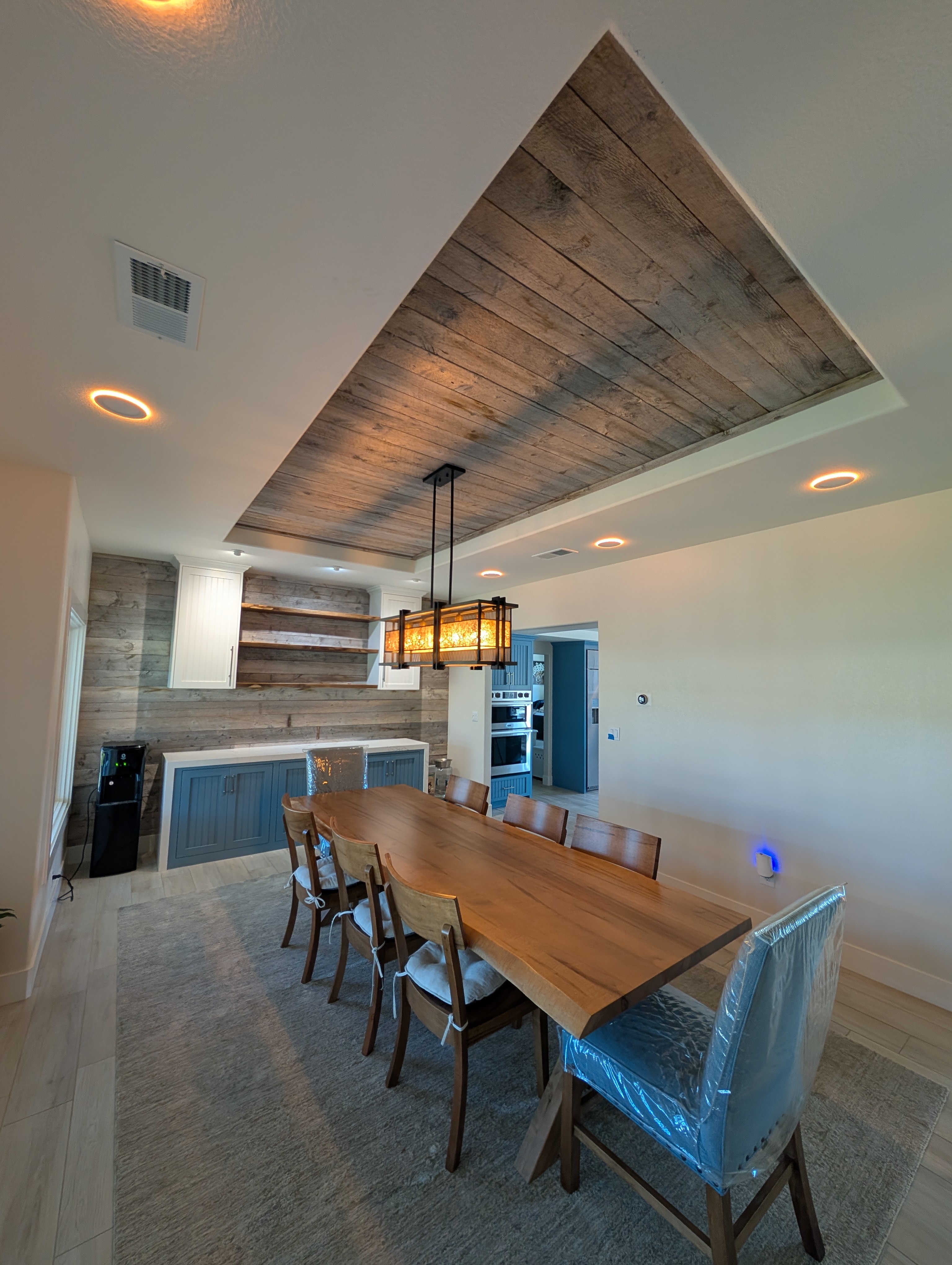 Reclaimed barn wood dining room, finished, with tray ceiling and live-edge dining table, Norco CA