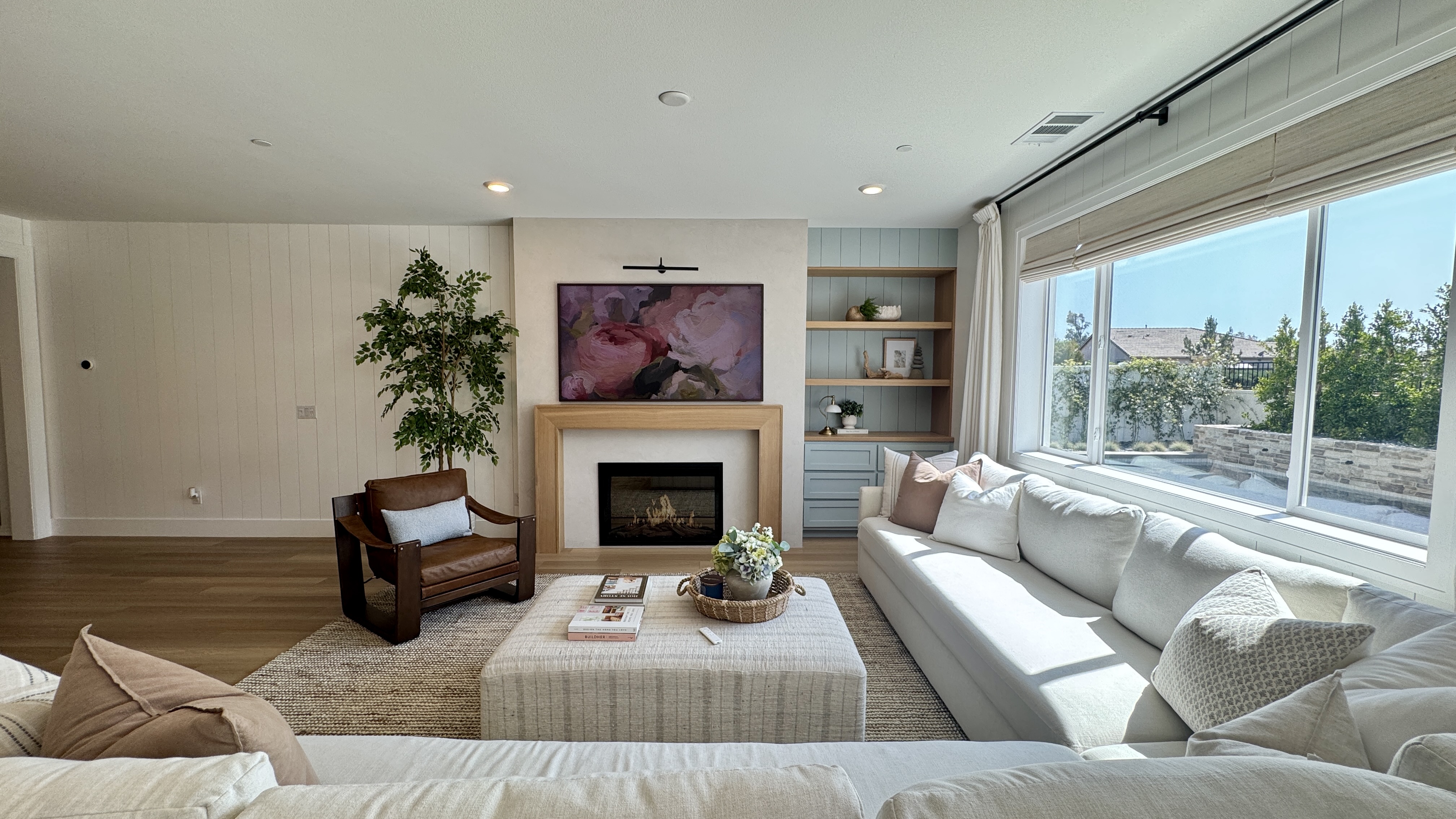 Finished great room with framed fireplace, white oak mantel, and built-ins, Menifee CA