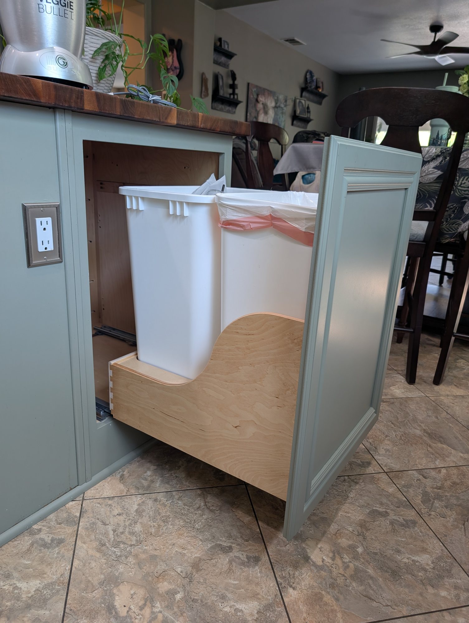 Double trash and recycling pull-out in a custom kitchen island cabinet, Menifee CA